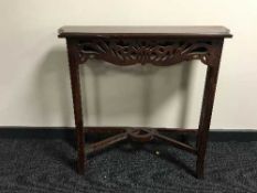 A shaped mahogany hall table