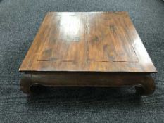 An oriental style low coffee table