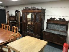 A three piece walnut bedroom suite comprising of mirror door wardrobe,