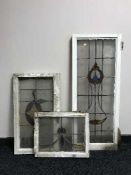 Three framed stained glass leaded windows