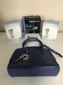 A box of Radley handbag, Babyliss men's grooming kit,