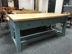 A painted pine farmhouse serving table fitted with eight drawers,