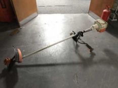 A Sthil petrol strimmer