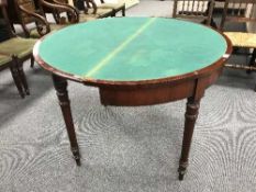 A Victorian mahogany d-shaped TOT table