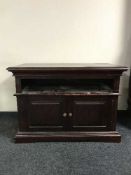 A stained pine entertainment unit