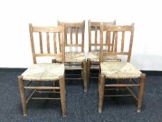 A set of four early 20th century kitchen chairs