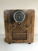 A Pegasus value radio, carpet bowls, clock,
