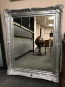 A silvered bevelled mirror