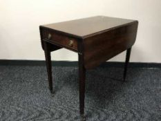 A Victorian mahogany Pembroke table