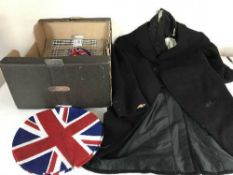 A box of place mats, tea towels,