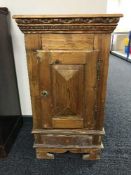 A late 19th century continental pine cabinet