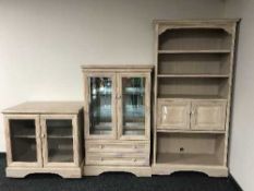 A contemporary wash pine display cabinet,