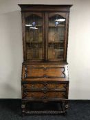 A late Victorian oak bureau bookcase