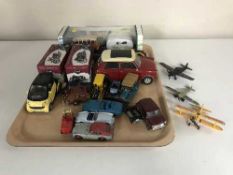 A tray of boxed and loose die cast vehicles and planes