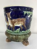 A Majolica style planter depicting deer