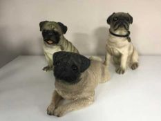 Seven contemporary dog and meerkat ornaments