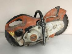 A Stihl saw and a cased Erbauer 24 volt drill with batteries