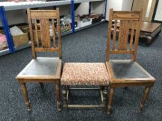 A carved oak footstool and Edwardian oak dining chairs