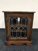 An oak Old Charm audio cabinet