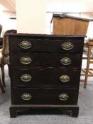 A Victorian four drawer chest on bracket feet