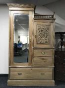 An Edwardian satin wood gent's wardrobe