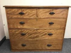 An antique pine four drawer chest
