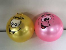 Twelve plastic crates of balls and three wooden car display cases containing fifteen die cast cars