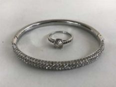 A 9ct gold ring, a .