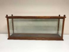 A glazed counter top ship display cabinet