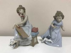 A Lladro figure, girl seated on telephone,