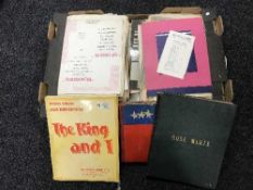 Two boxes of sheet music and music books