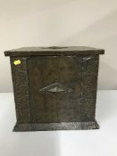 An early 20th century copper coal receiver with liner