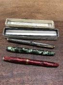 A Parker fountain pen with 14ct gold nib, together with two Conway Stewart pens,
