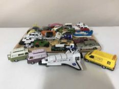 Two trays of play worn die cast vehicles including cars,