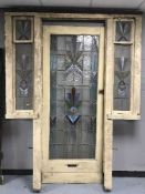 A late 19th century stained leaded glass front door