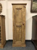 A reclaimed pine single door cupboard