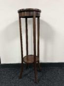 An inlaid mahogany two tier plant stand