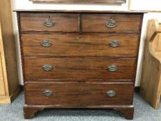 A nineteenth century mahogany chest of five drawers on bracket feet