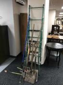 A set of folding steps and bundle of garden tools