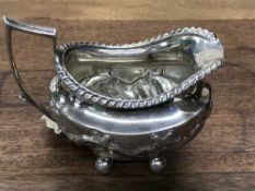 A silver cream jug, London marks, 3.