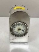 A small silver dome top desk clock with French movement