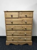 A pine six drawer chest