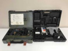 A cased Bosch electric hammer drill,