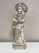 A large carved oriental figure - gentleman