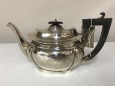 A sterling silver teapot