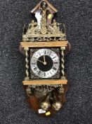 A reproduction weight driven striking wall clock