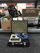 A cased Chinon camera with lens, quantity of projectors, Orion twin VCR deck, two DVD players,