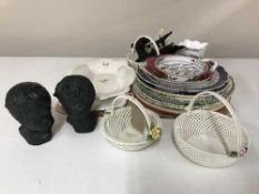 A tray of assorted plates and plate stands, three china baskets,