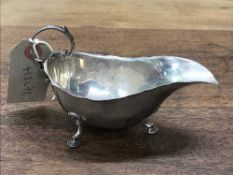 A silver sauce boat, Charles Boyton & Son, London 1910, 3.