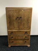 A 1930's walnut linen chest